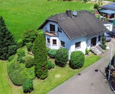 Zentrumsort 56593 Horhausen! Einfamilienhaus mit Garage und Hobbyraum in Sackgassenlage!